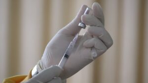 Nurse preparing a flu vaccine