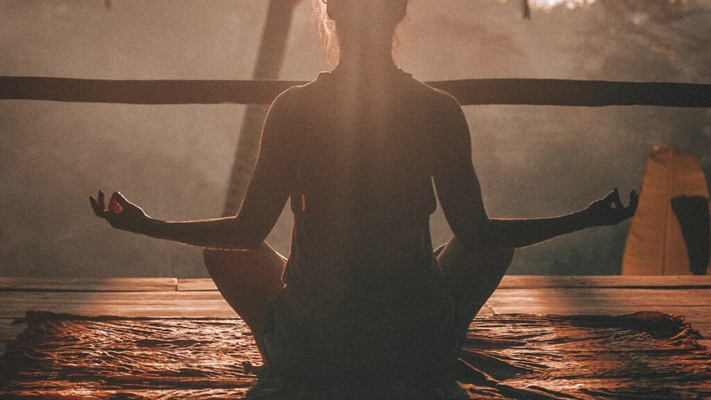 Woman practicing relaxation to manage stress