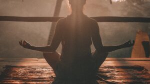 Woman practicing relaxation to manage stress