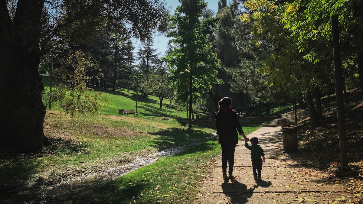 Parent spending active time outdoors with a child